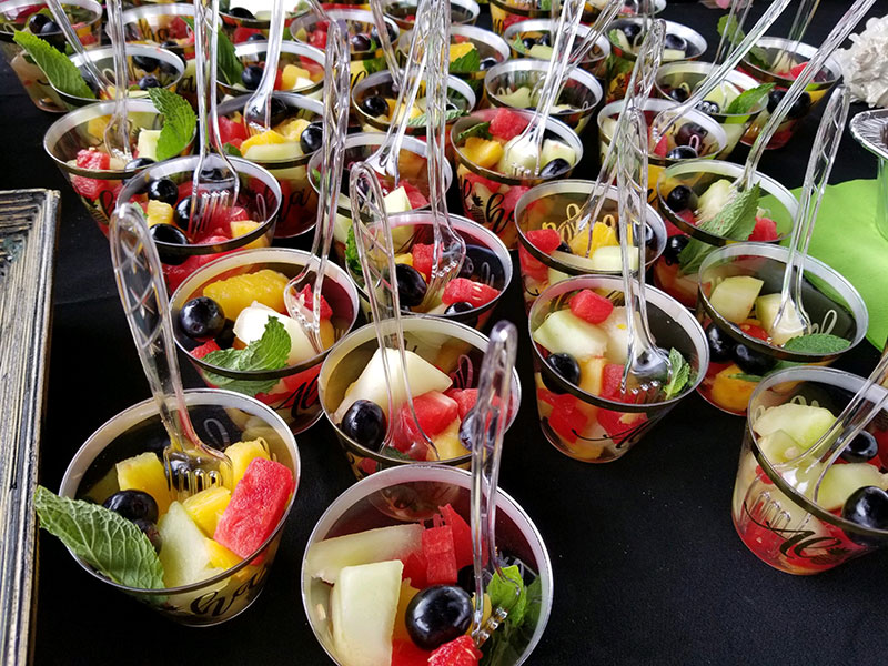 Hawaiian Luau Entertainment and Houston Catering Package for Your